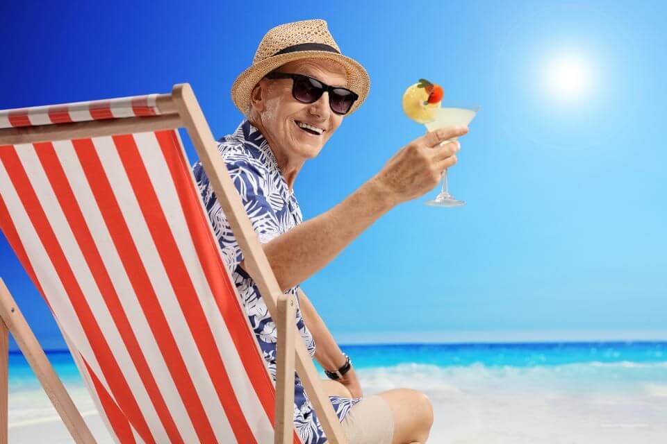 retirement at the beach with cocktail